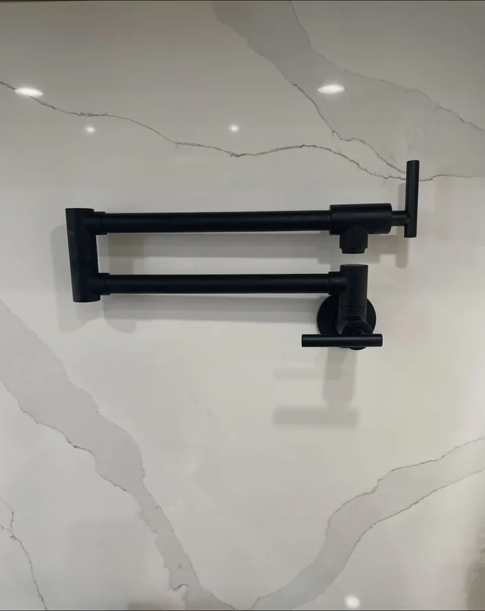 Wall-mounted pot filler fixture installation